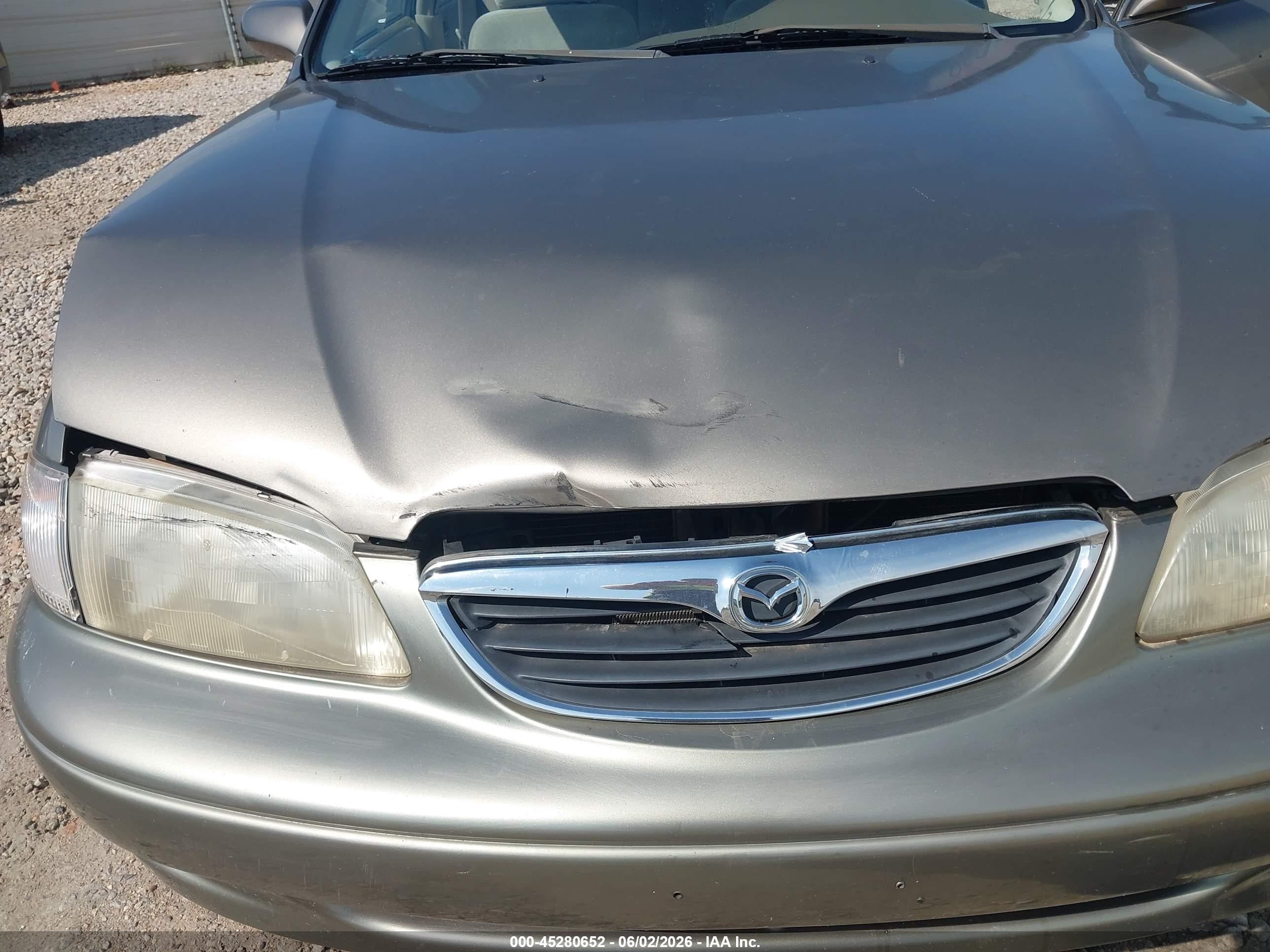 1999 Mazda 626 Es/lx Brown vin: 1YVGF22C7X5865541