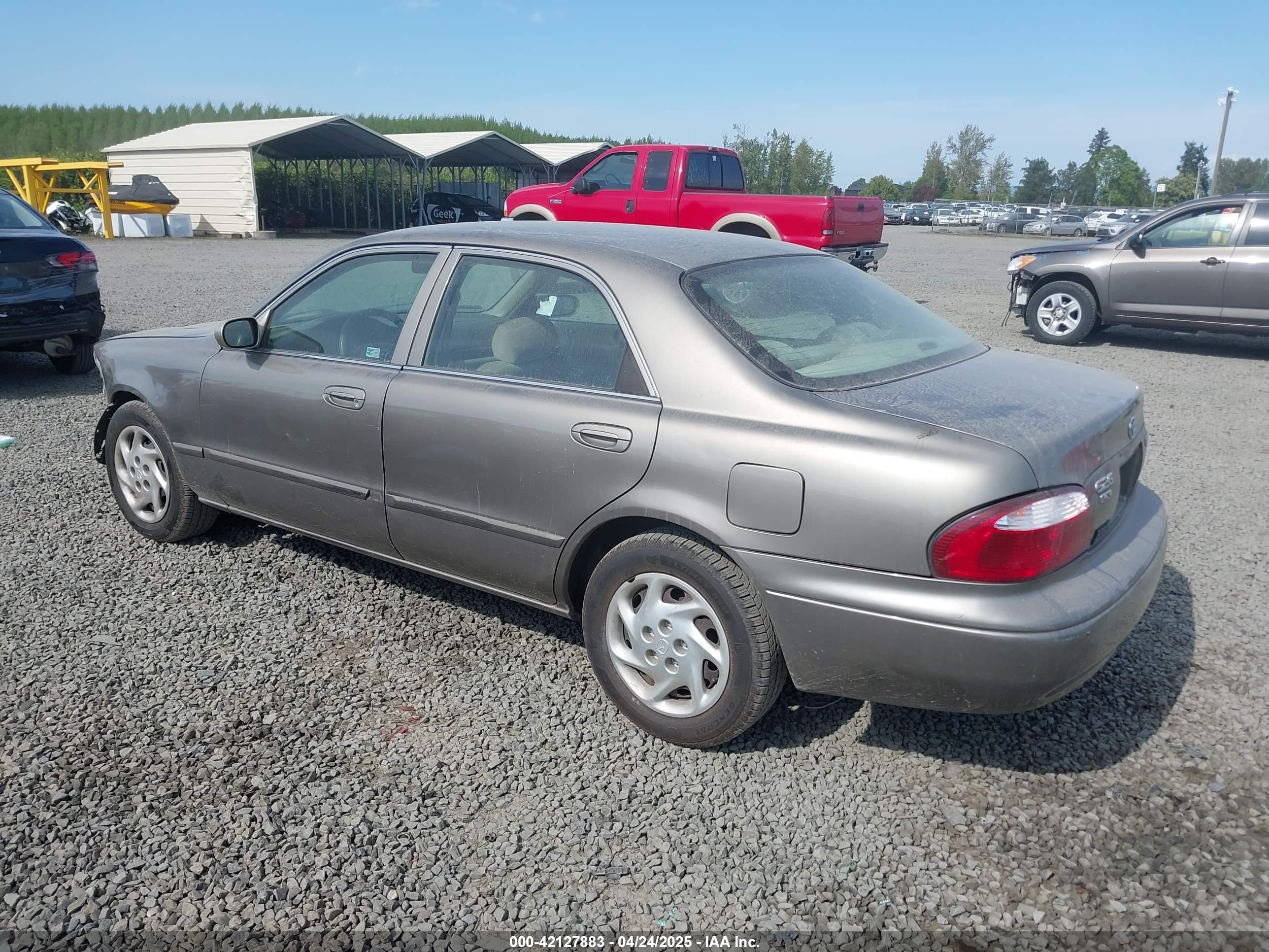 2001 Mazda 626 Es/lx Brown vin: 1YVGF22C815203829