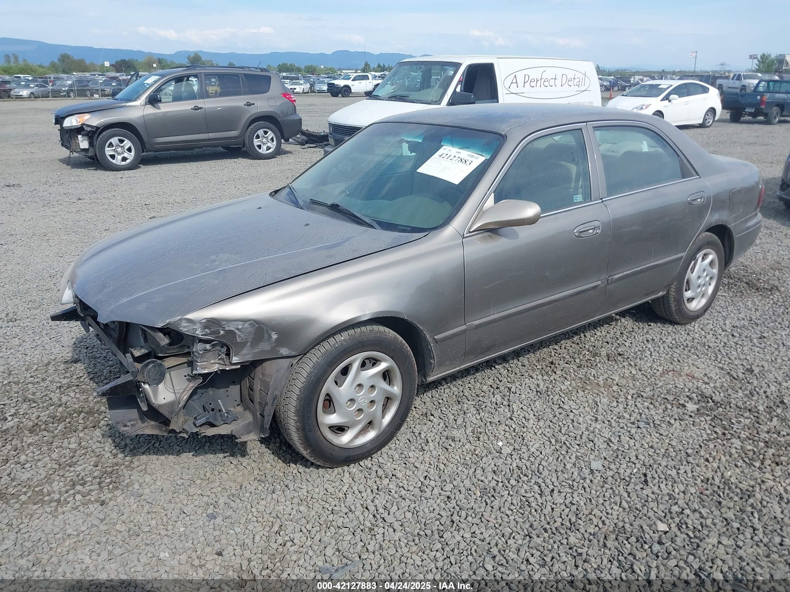 2001 Mazda 626 Es/lx Brown vin: 1YVGF22C815203829
