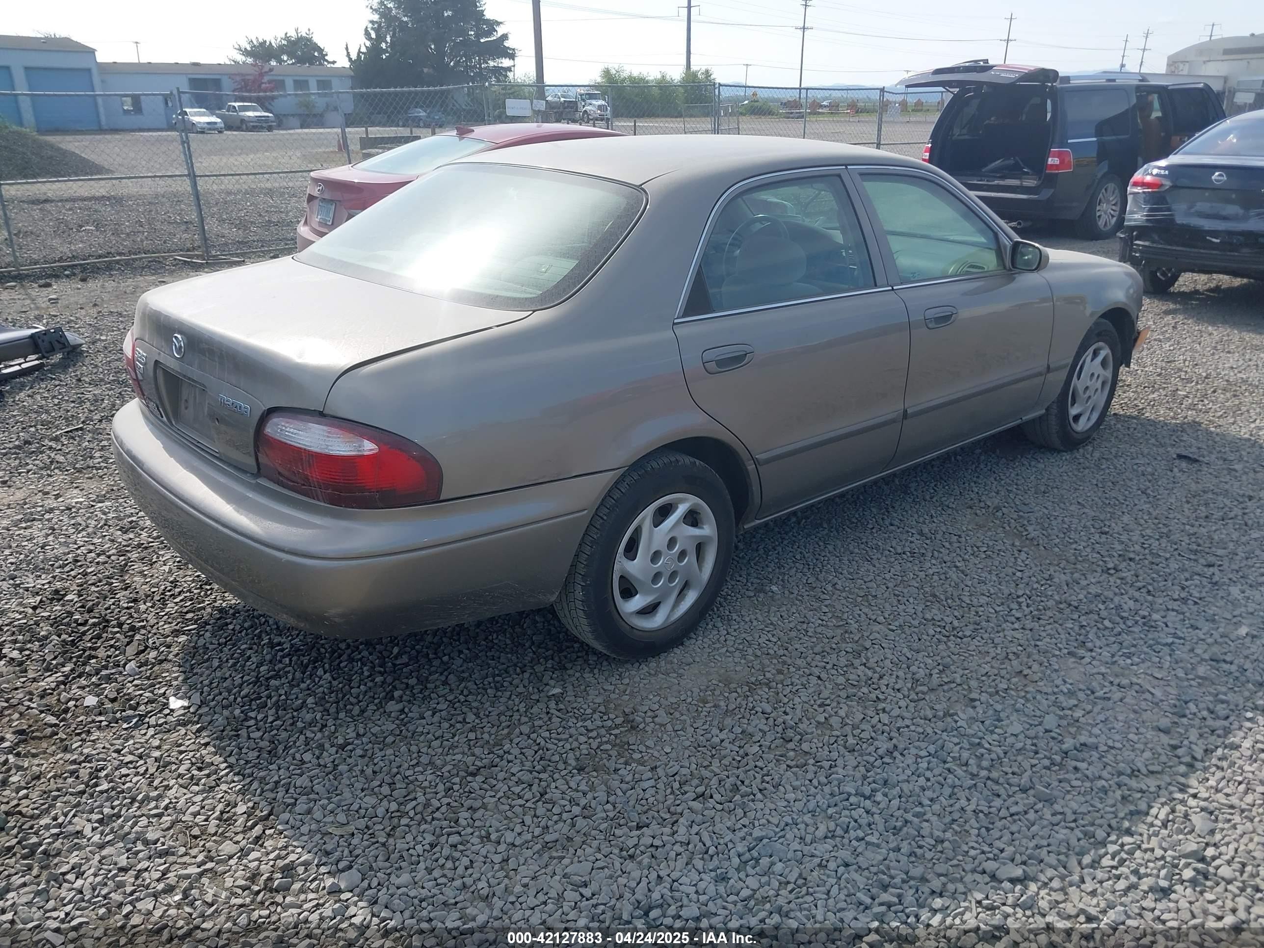 2001 Mazda 626 Es/lx Brown vin: 1YVGF22C815203829