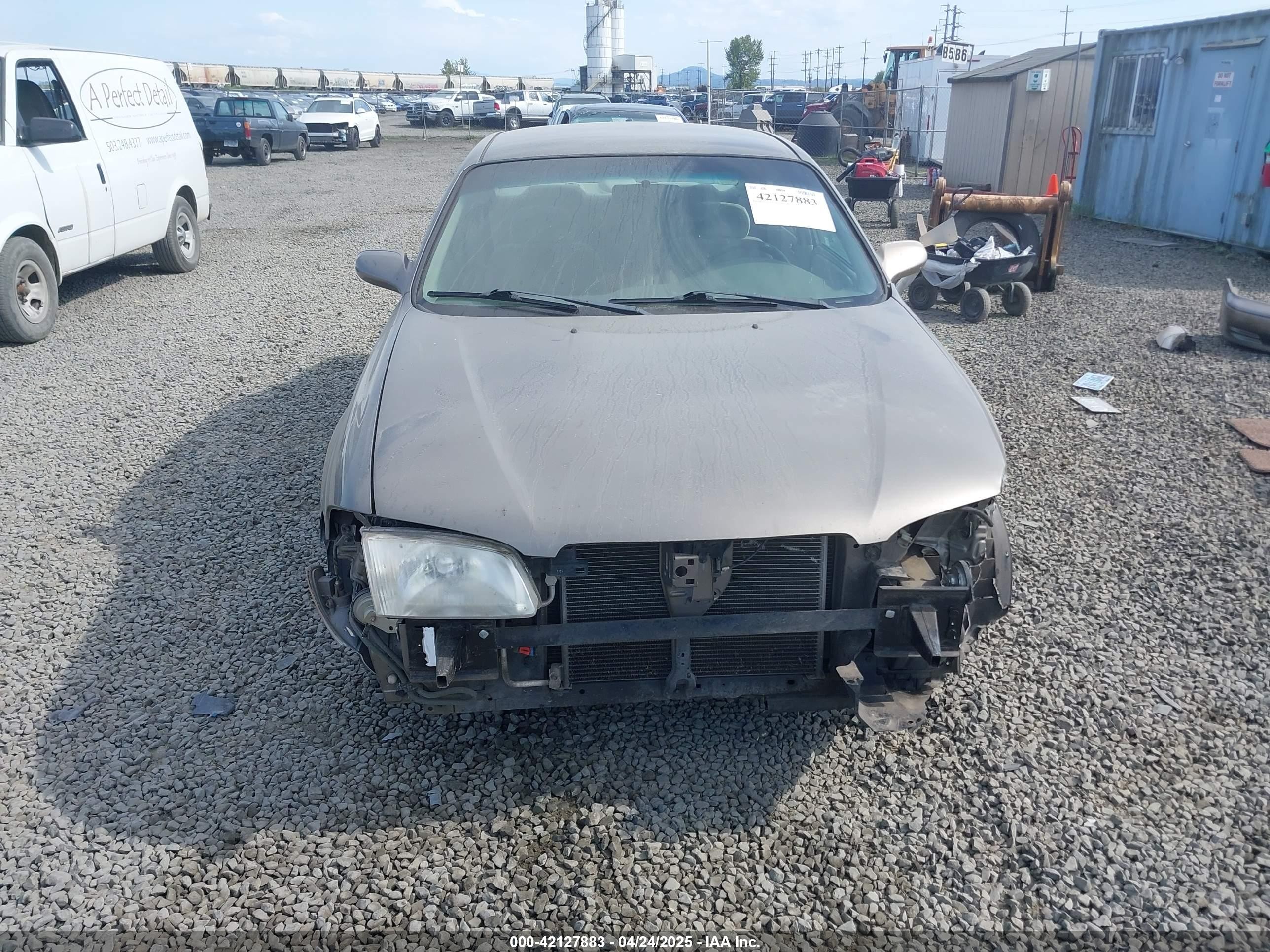 2001 Mazda 626 Es/lx Brown vin: 1YVGF22C815203829
