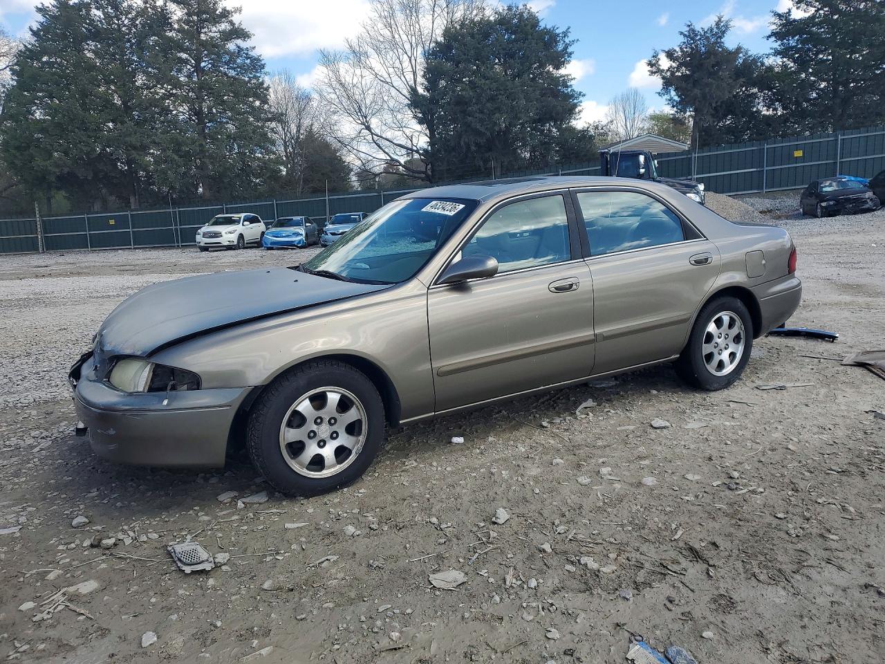 1998 Mazda 626 Dx Tan vin: 1YVGF22C8W5773403