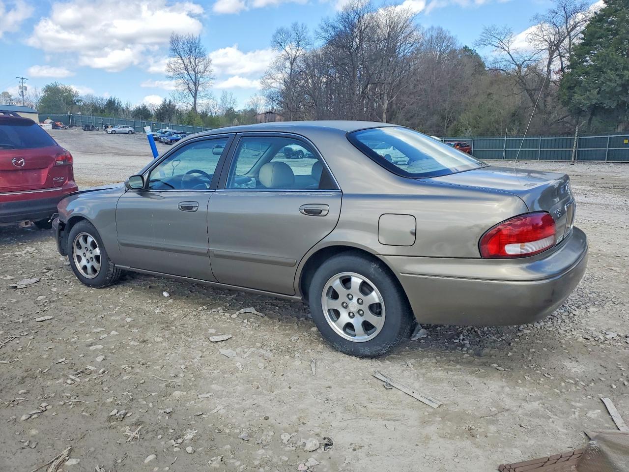 1998 Mazda 626 Dx Tan vin: 1YVGF22C8W5773403