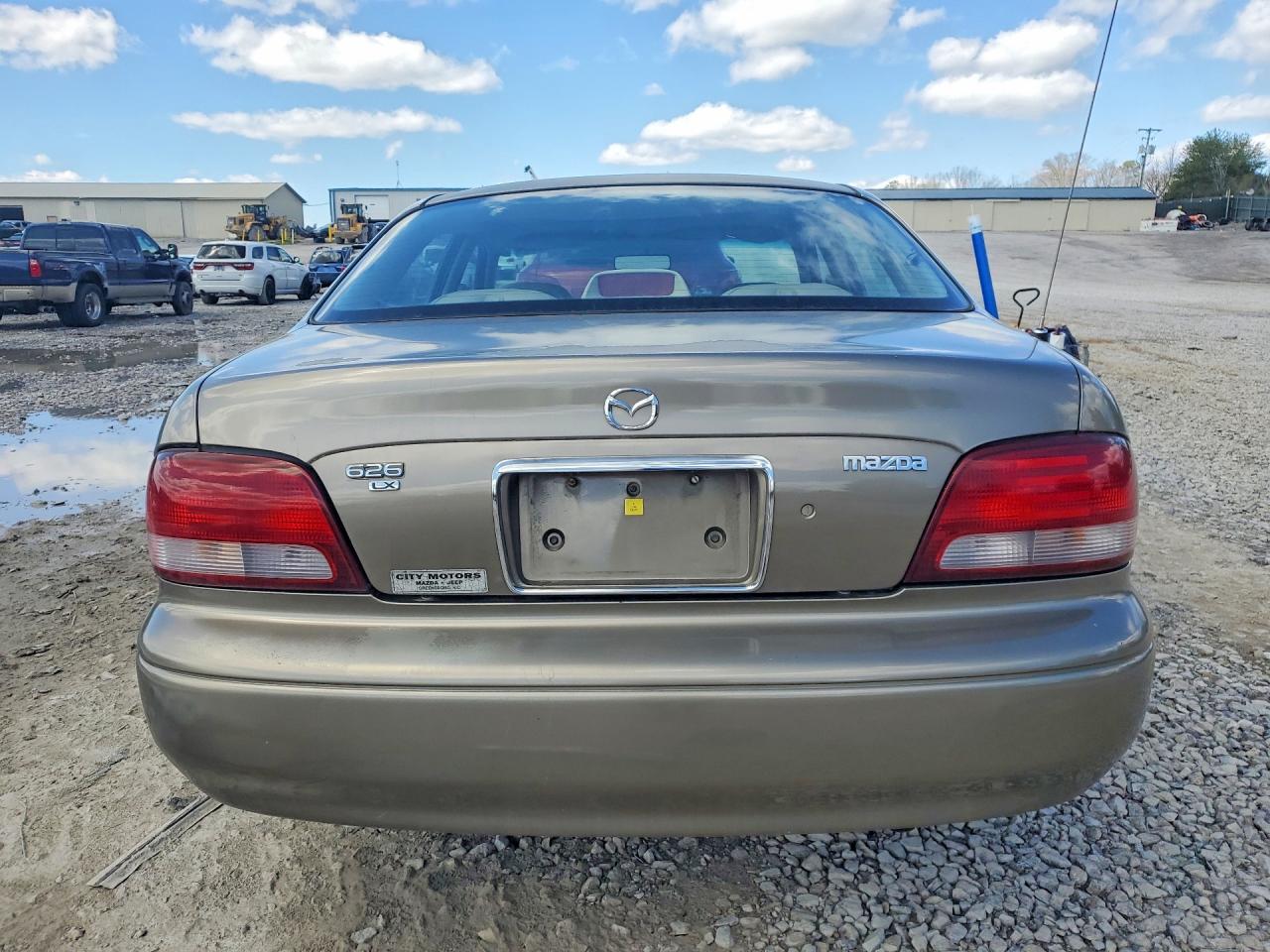 1998 Mazda 626 Dx Tan vin: 1YVGF22C8W5773403