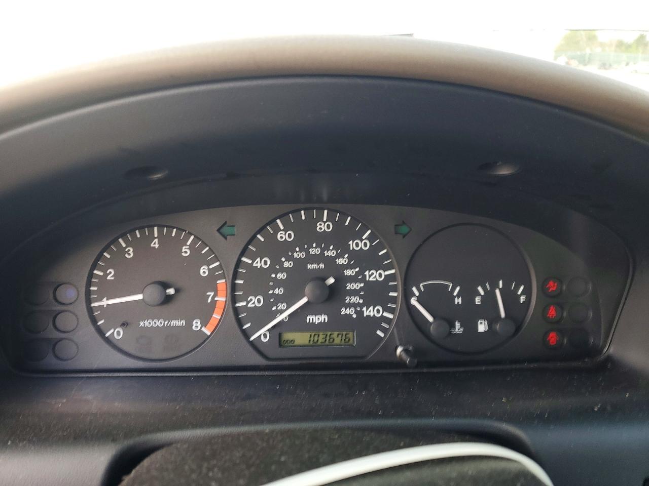 1998 Mazda 626 Dx Tan vin: 1YVGF22C8W5773403