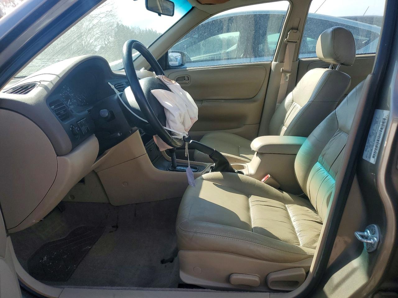 1998 Mazda 626 Dx Tan vin: 1YVGF22C8W5773403
