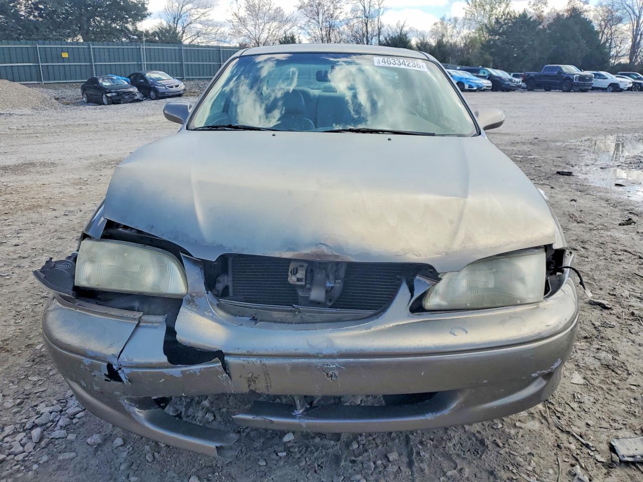 1998 Mazda 626 Dx Tan vin: 1YVGF22C8W5773403