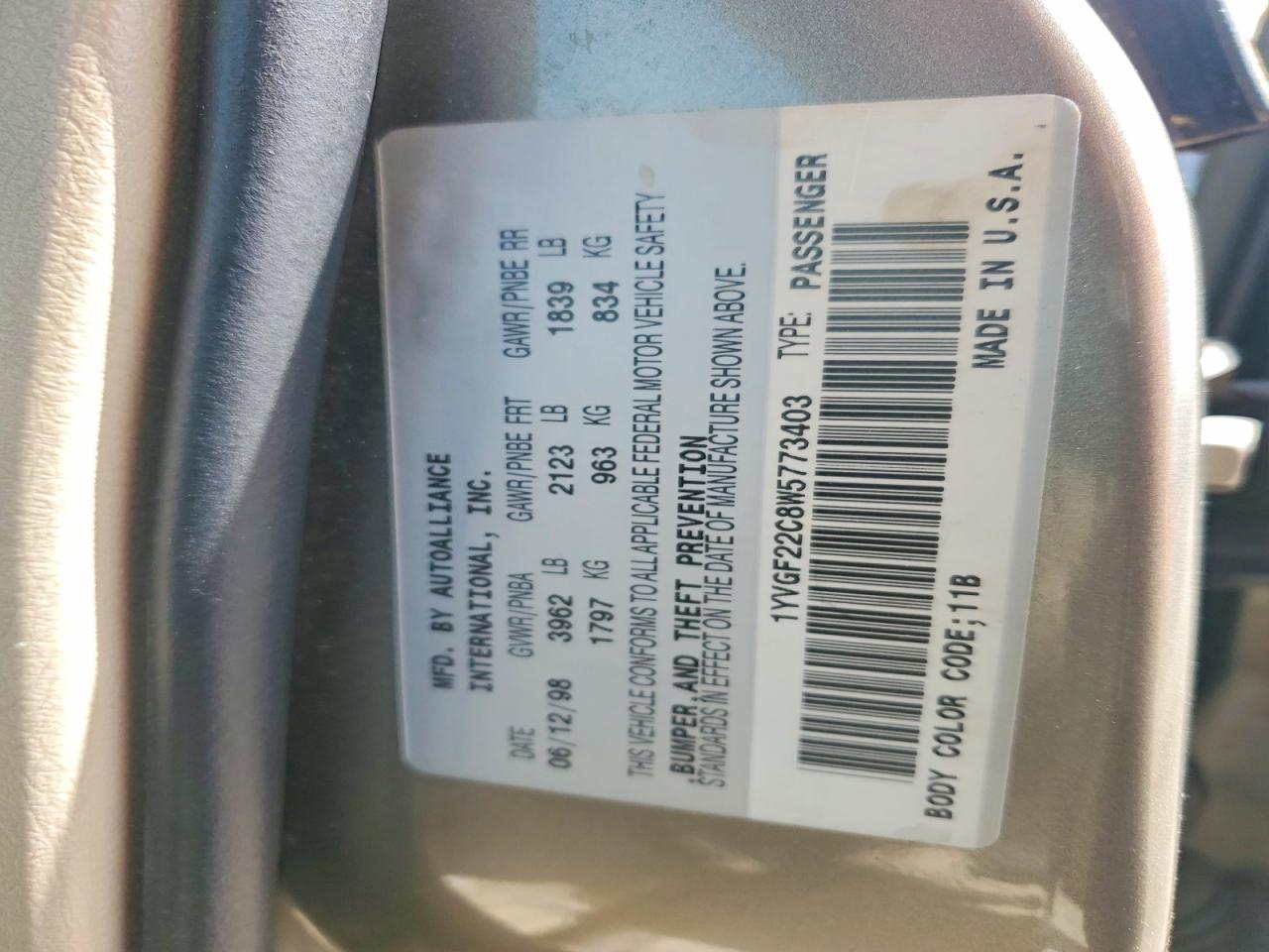 1998 Mazda 626 Dx Tan vin: 1YVGF22C8W5773403