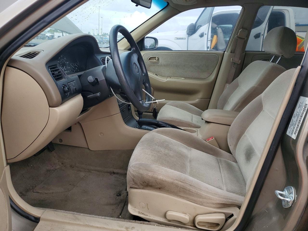 1999 Mazda 626 Es Tan vin: 1YVGF22C9X5880008