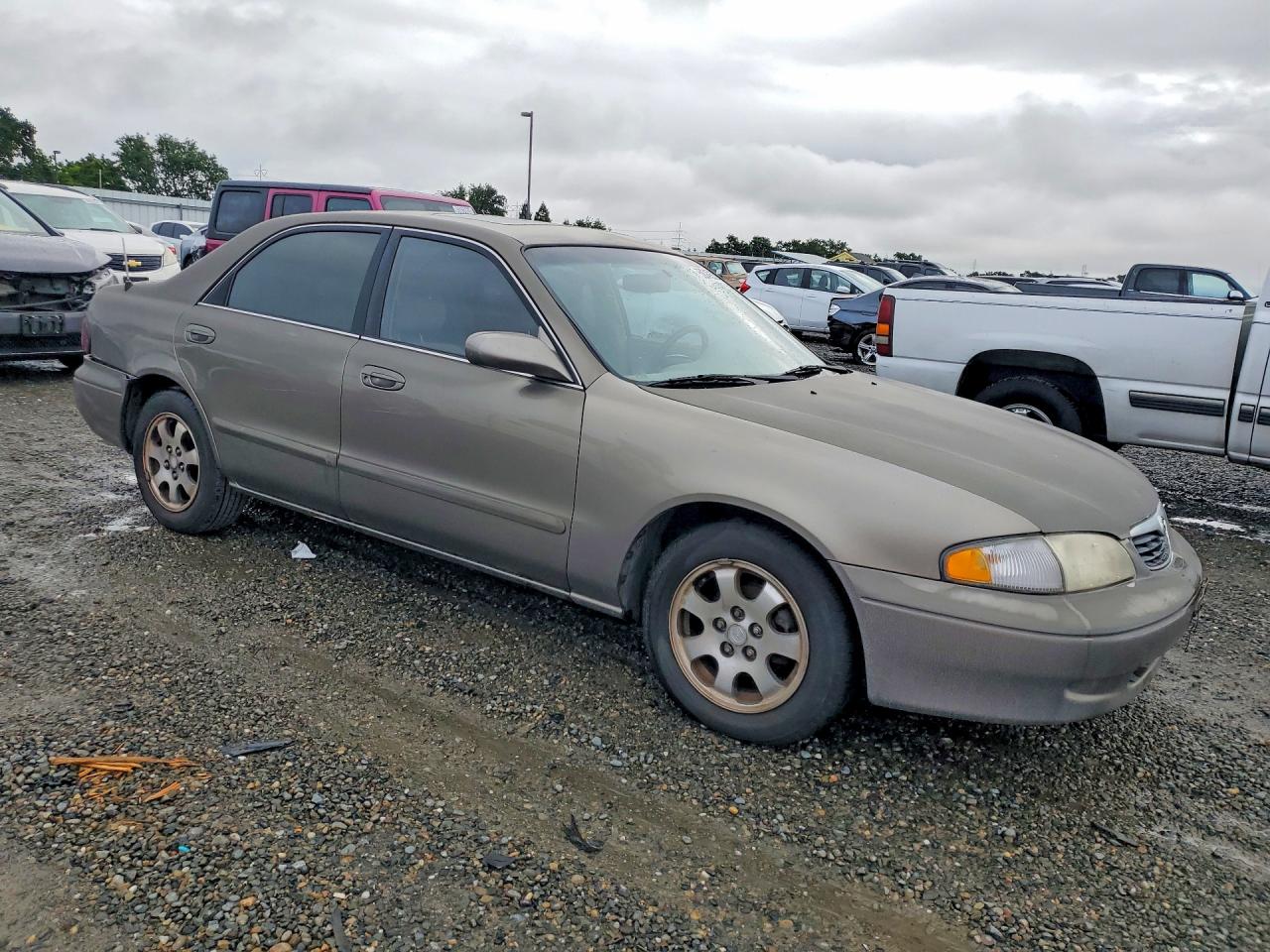 1999 Mazda 626 Es Tan vin: 1YVGF22C9X5880008