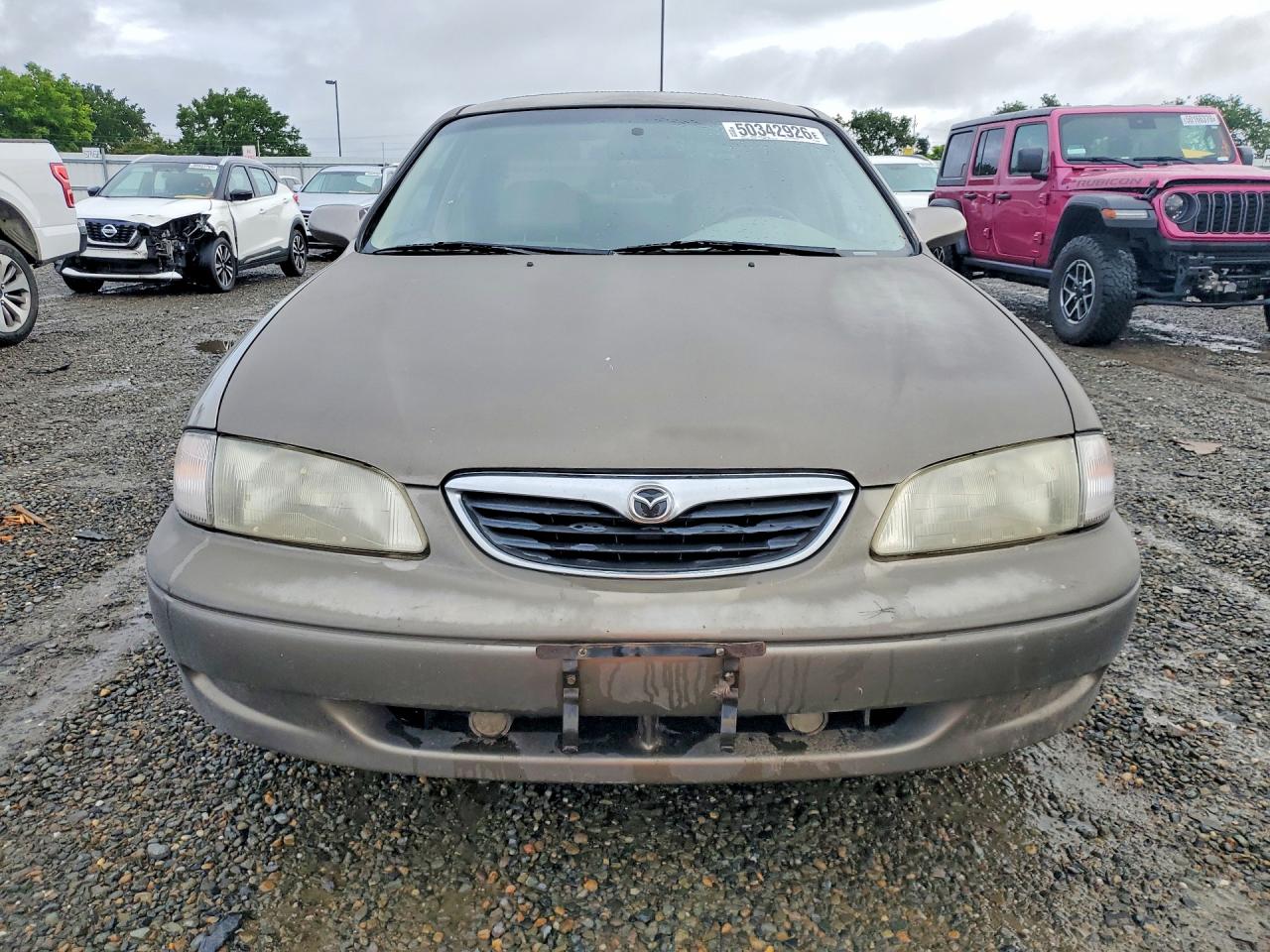 1999 Mazda 626 Es Tan vin: 1YVGF22C9X5880008