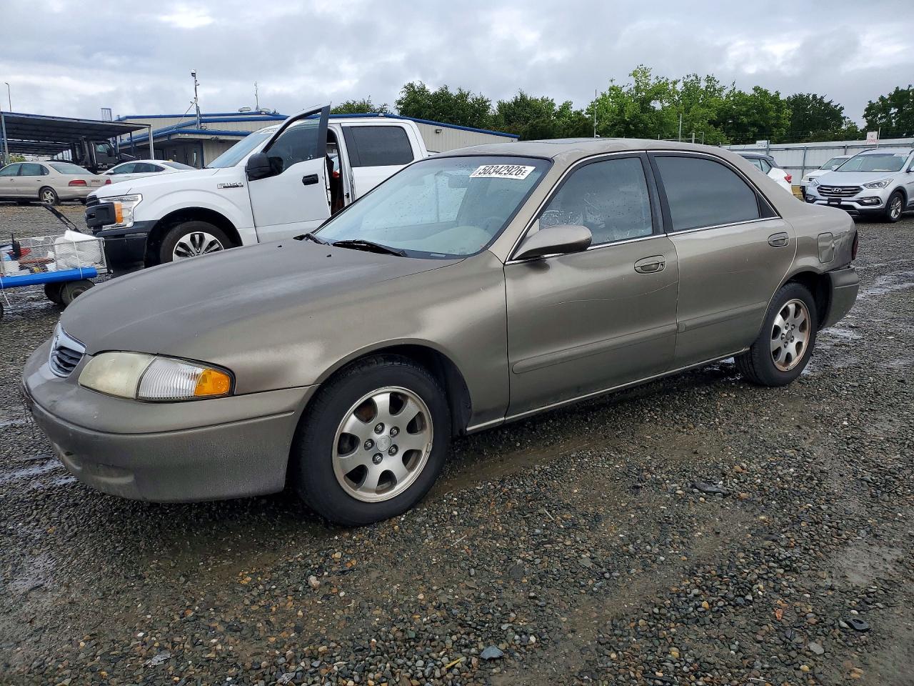 1999 Mazda 626 Es Tan vin: 1YVGF22C9X5880008