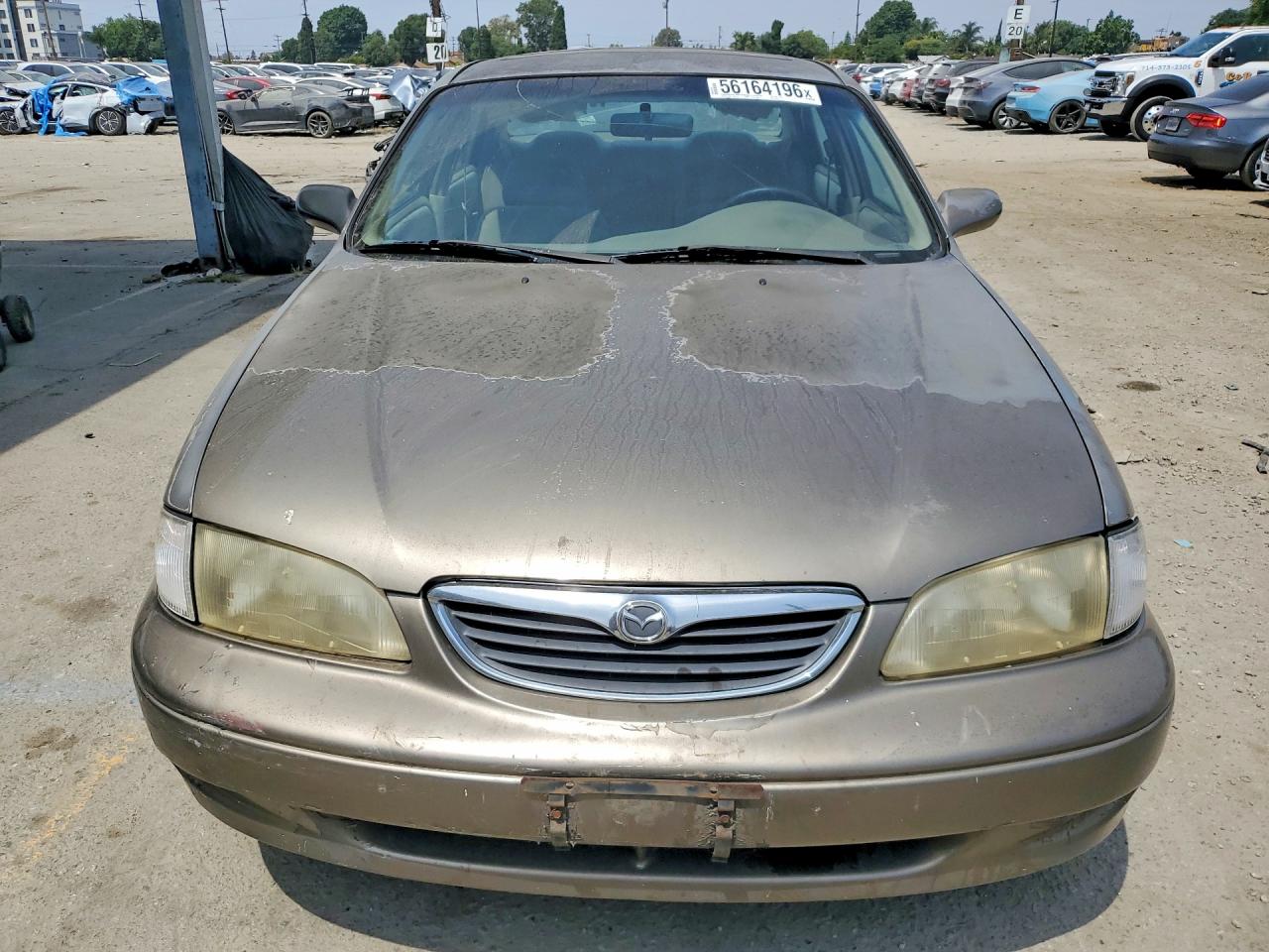 1999 Mazda 626 Es Золотой vin: 1YVGF22D3X5822551