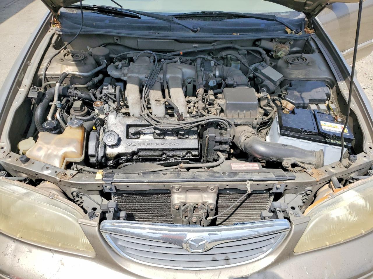 1999 Mazda 626 Es Золотой vin: 1YVGF22D3X5822551