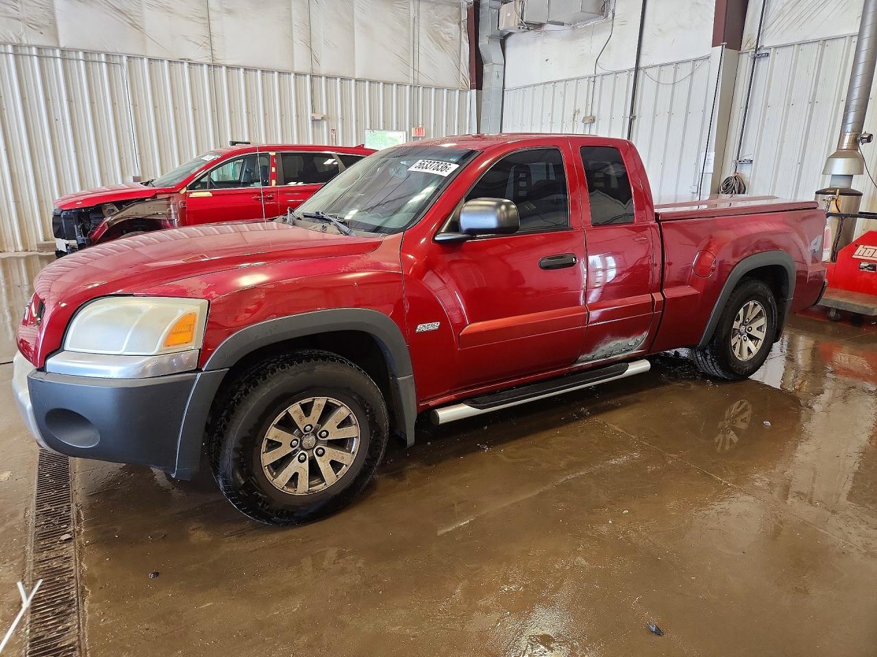 2006 Mitsubishi Raider Durocross Maroon vin: 1Z7HT32N76S543108