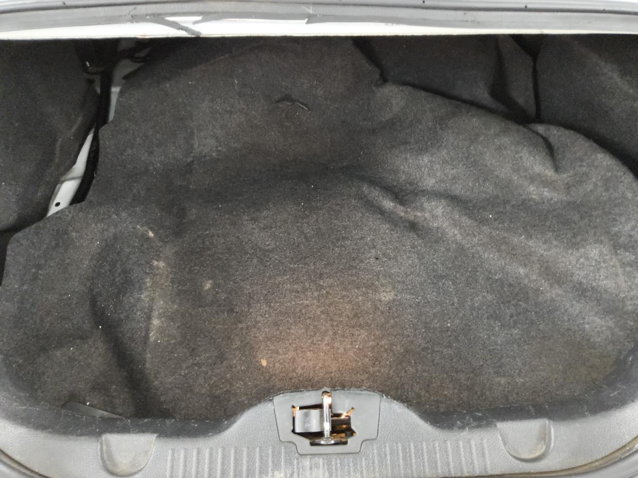 2013 Ford Mustang White vin: 1ZVBP8AM5D5282629 Damage: Trunk/Cargo Mat, Worn, Replacement Required