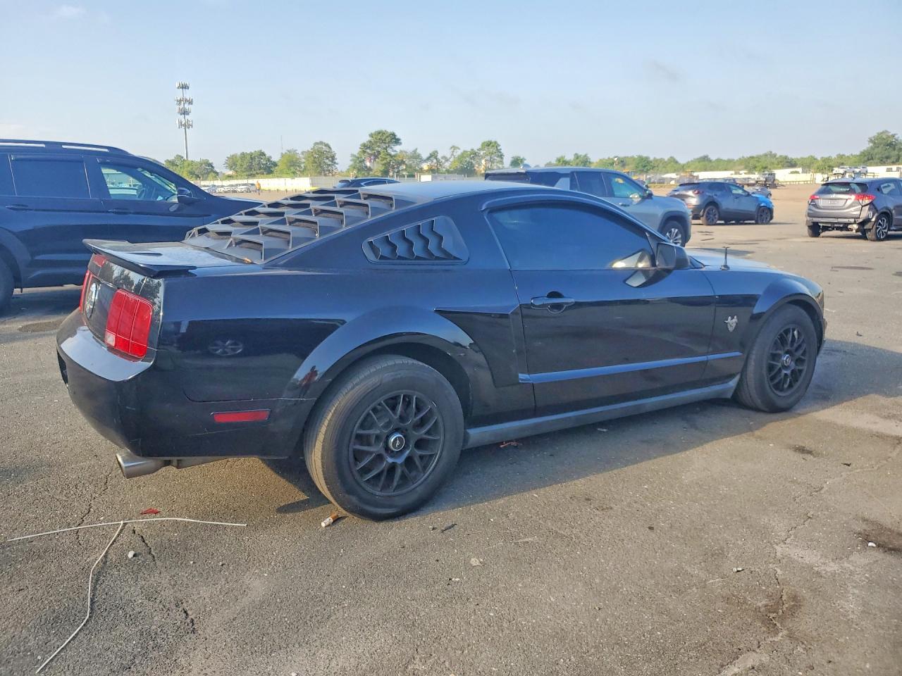 2009 Ford Mustang Black vin: 1ZVHT80N195114686