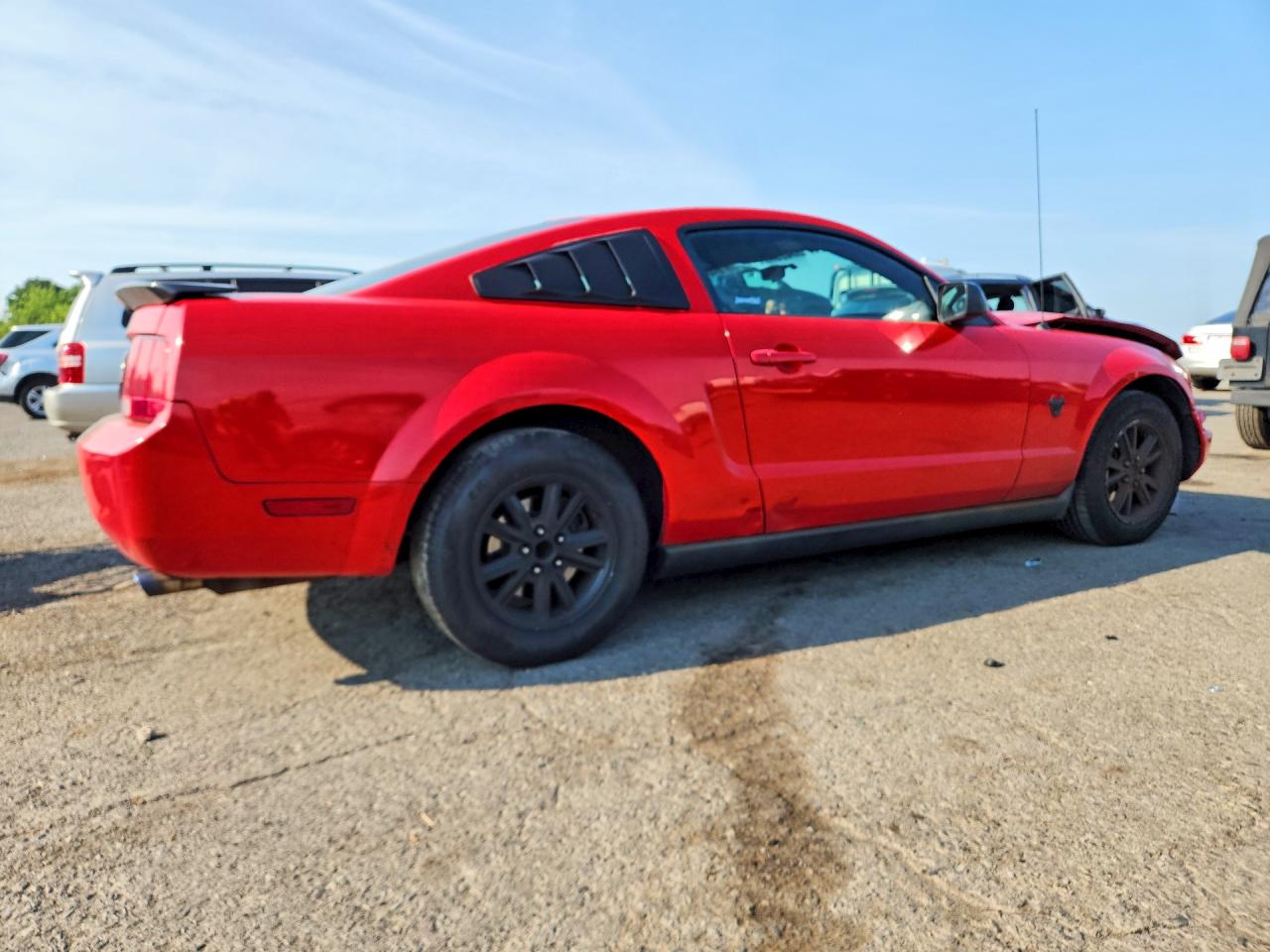 2009 Ford Mustang Red vin: 1ZVHT80N595141714