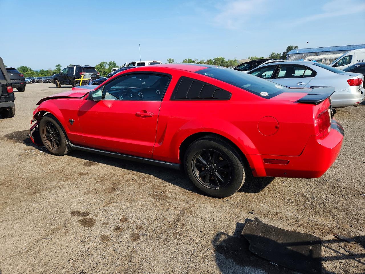 2009 Ford Mustang Red vin: 1ZVHT80N595141714