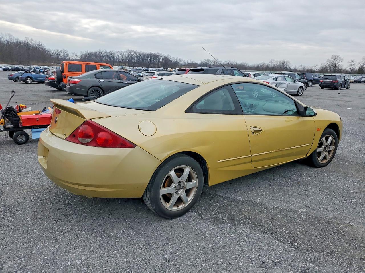 2000 Mercury Cougar Gold vin: 1ZWFT61LXY5615949