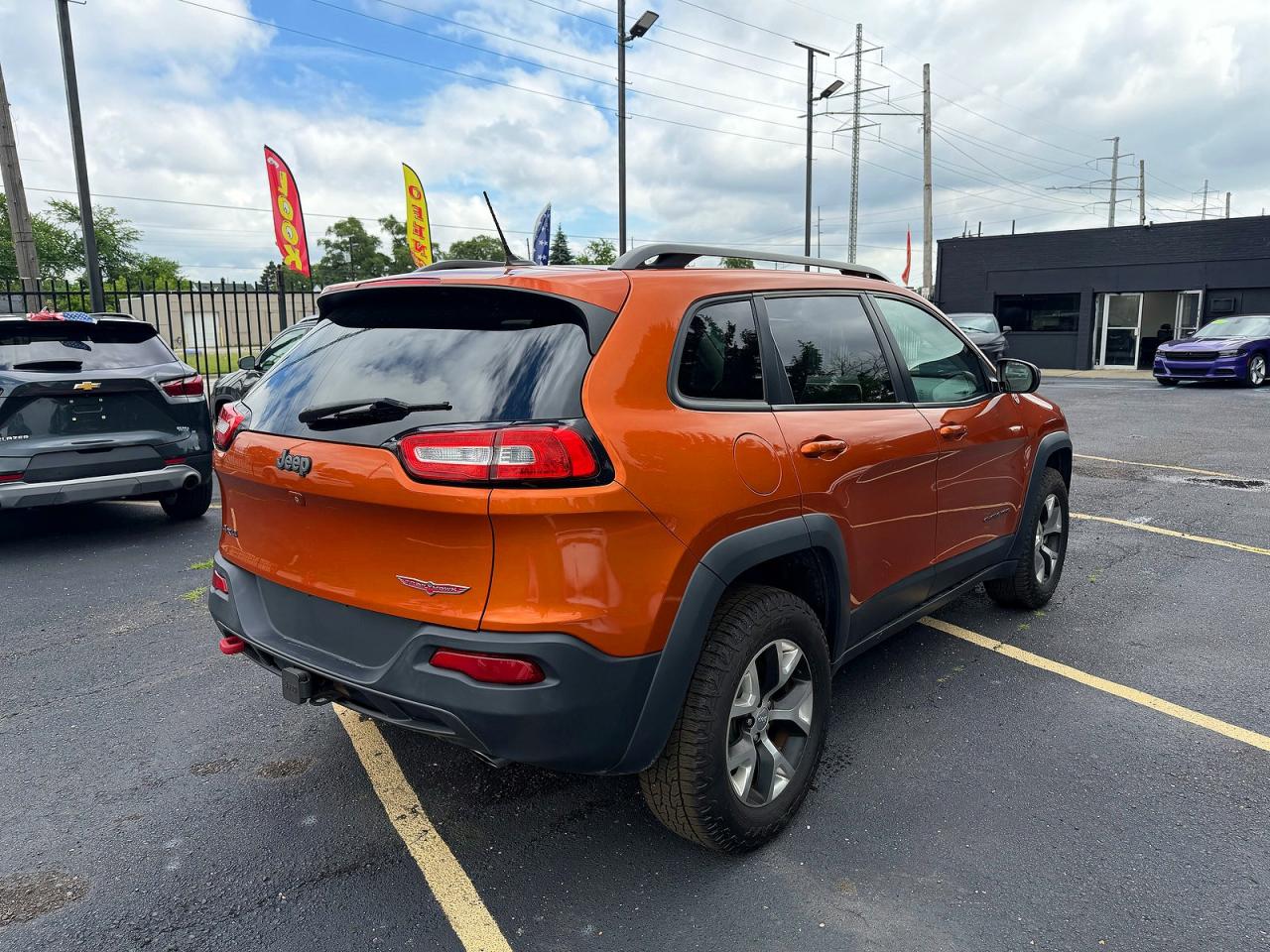 2015 Jeep Cherokee Trailhawk Orange vin: 1C4PJMBS8FW545113