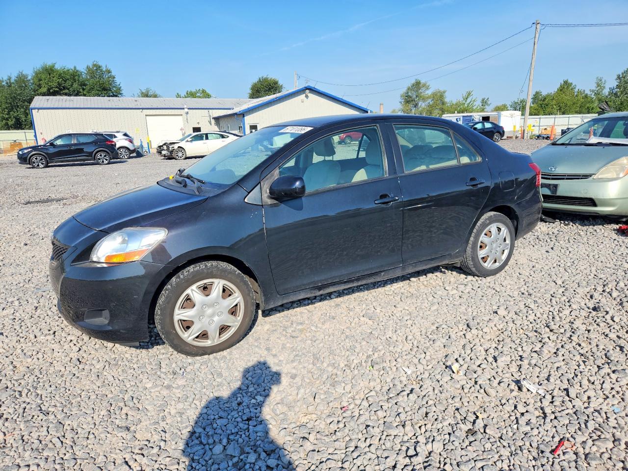 2010 Toyota Yaris Base Black vin: JTDBT4K37A1376091