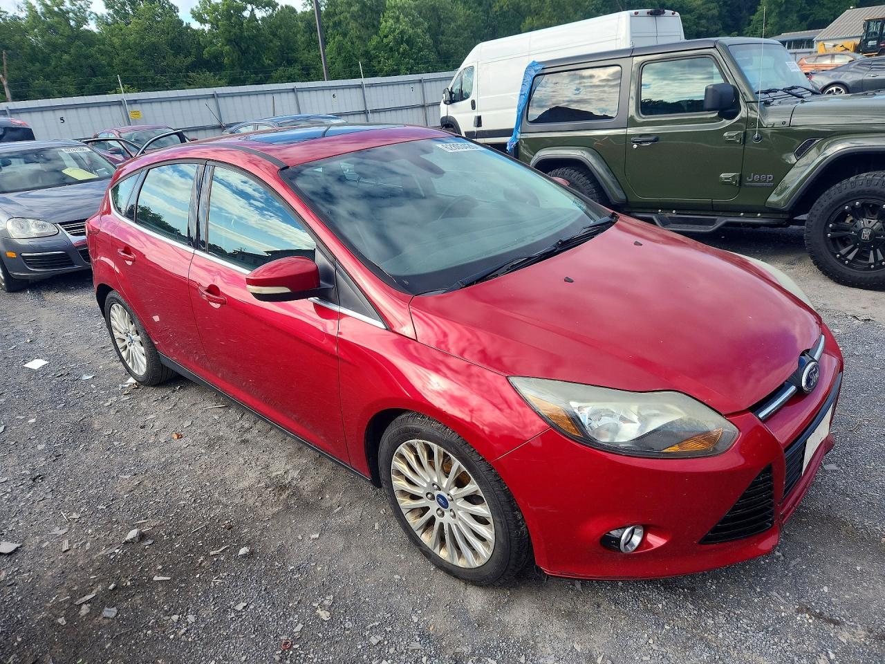 2012 Ford Focus Titanium Red vin: 1FAHP3N29CL308982