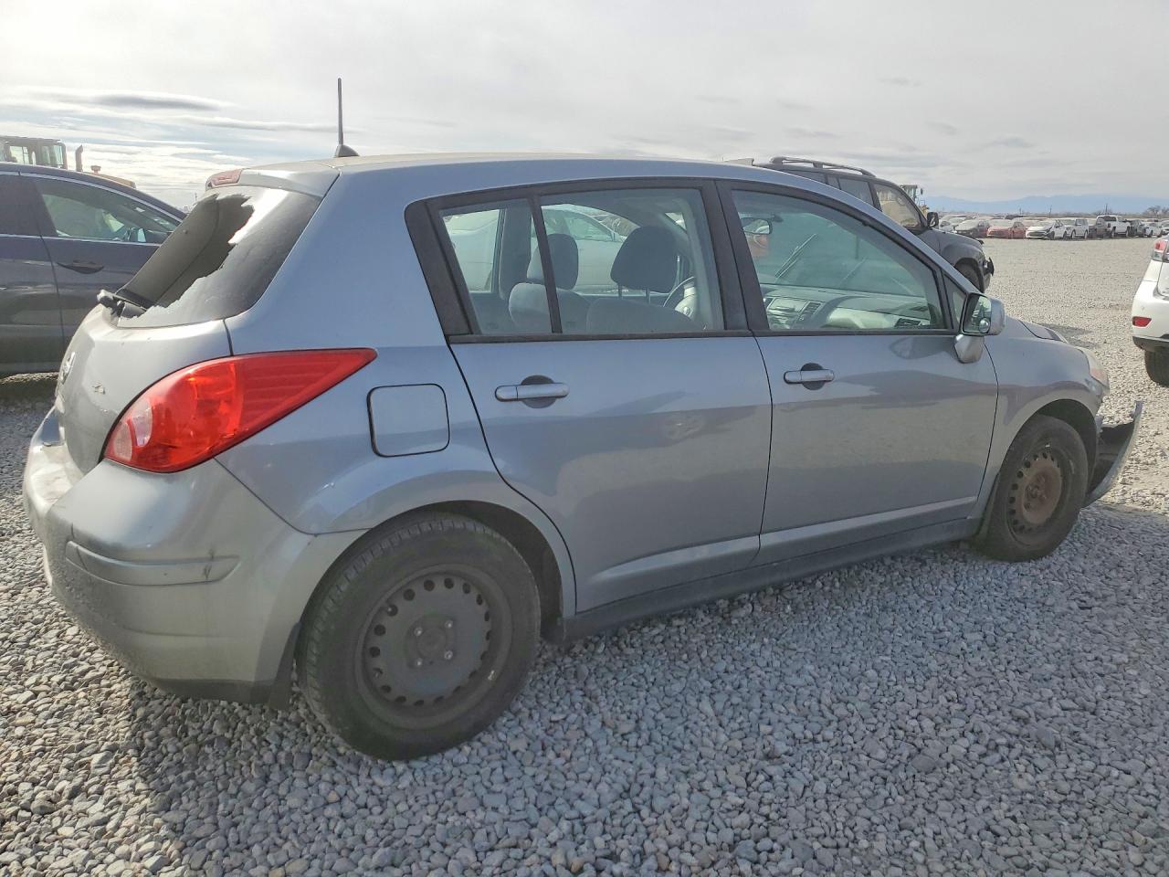 2009 Nissan Versa 1.8 S Silver vin: 3N1BC13E59L500915