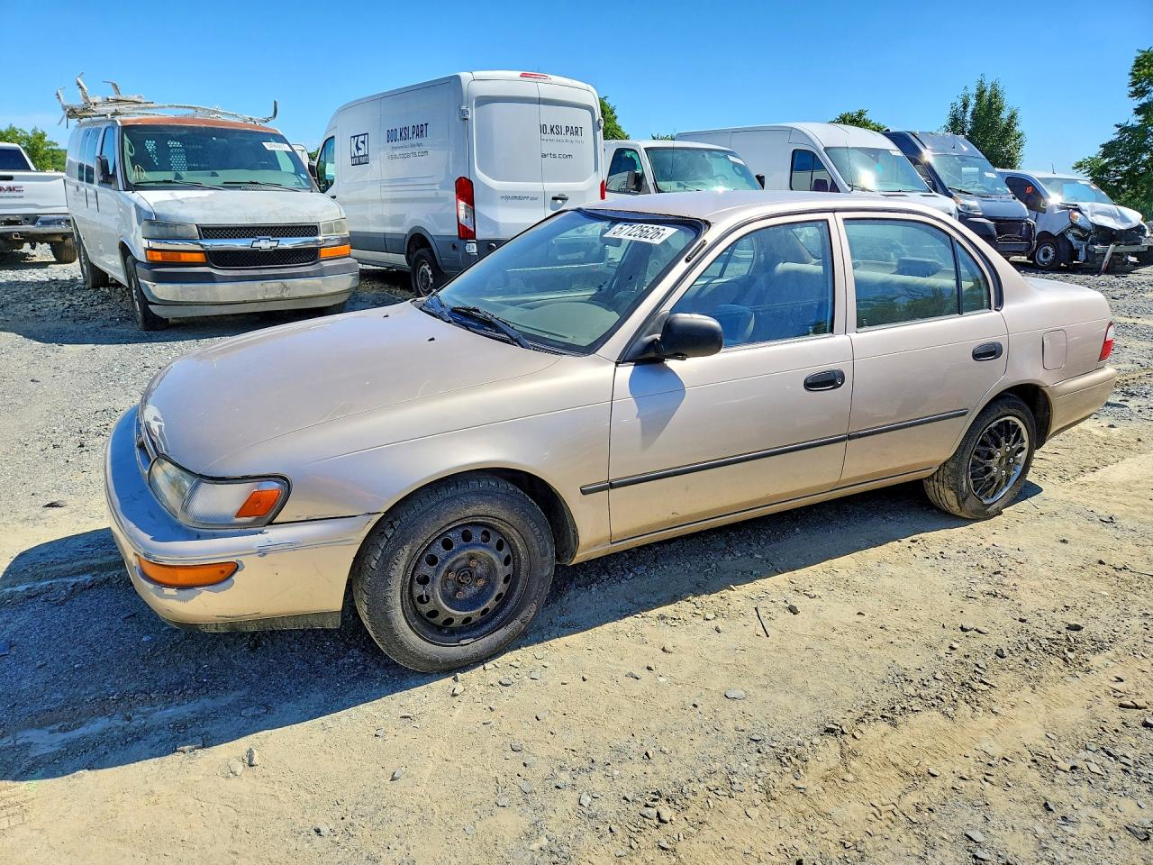 1997 Toyota Corolla Base Gold vin: 2T1BA02EXVC176906