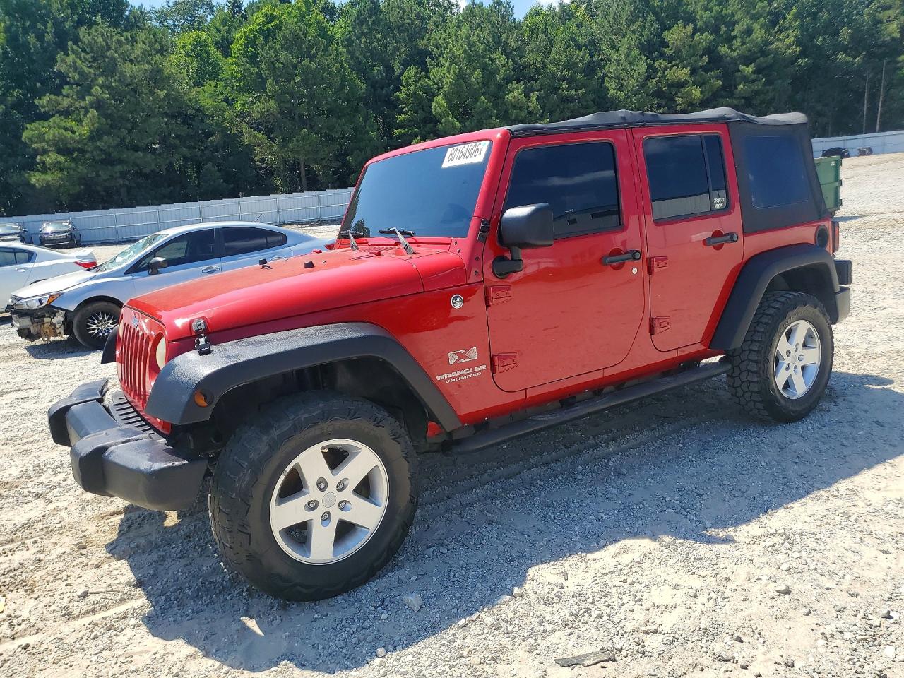 2009 Jeep Wrangler Unlimited X Red vin: 1J4GA39149L767302