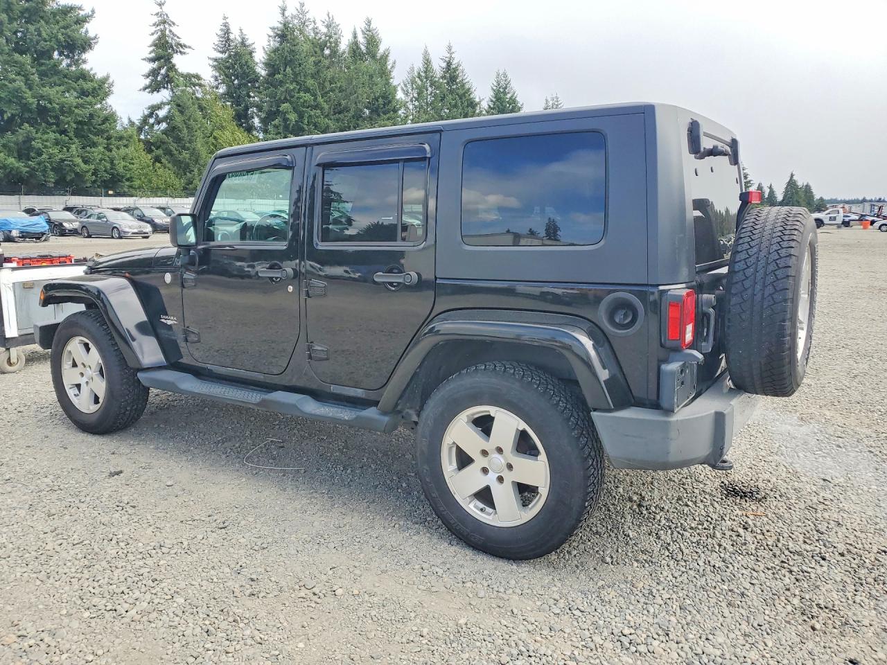 2010 Jeep Wrangler Unlimited Sahara Black vin: 1J4BA5H16AL115230
