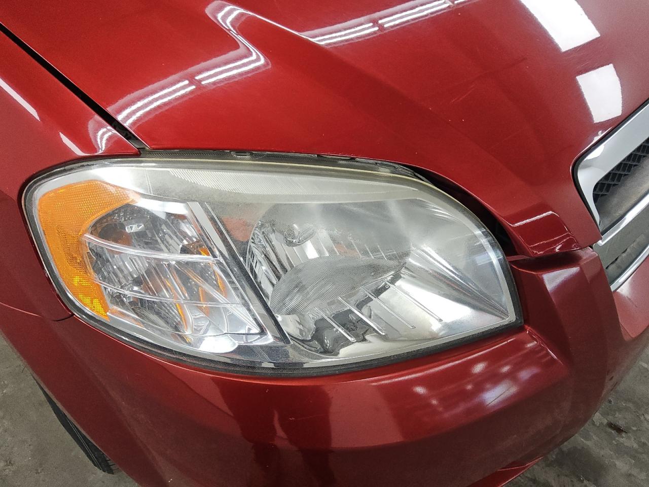 2011 Chevrolet Aveo Red vin: KL1TD5DE9BB220532 Damage: Right Head Lamp, Faded, Repair Required
