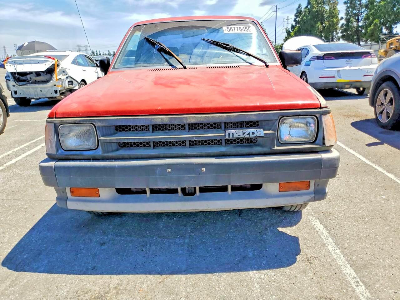 1991 Mazda B2600 Cab Plus Red vin: JM2UF3143M0116622