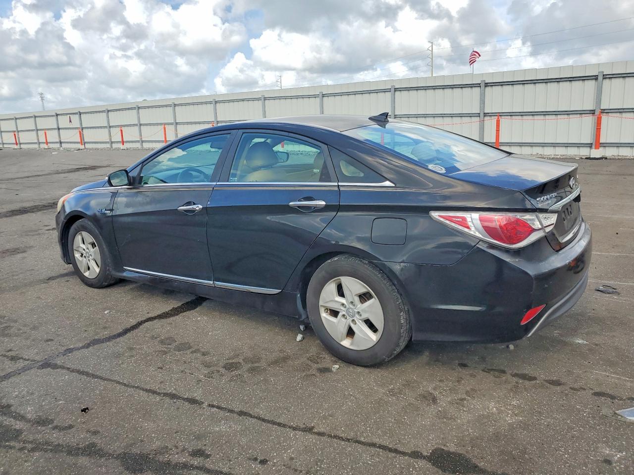 2012 Hyundai Sonata Hybrid Черный vin: KMHEC4A48CA024725
