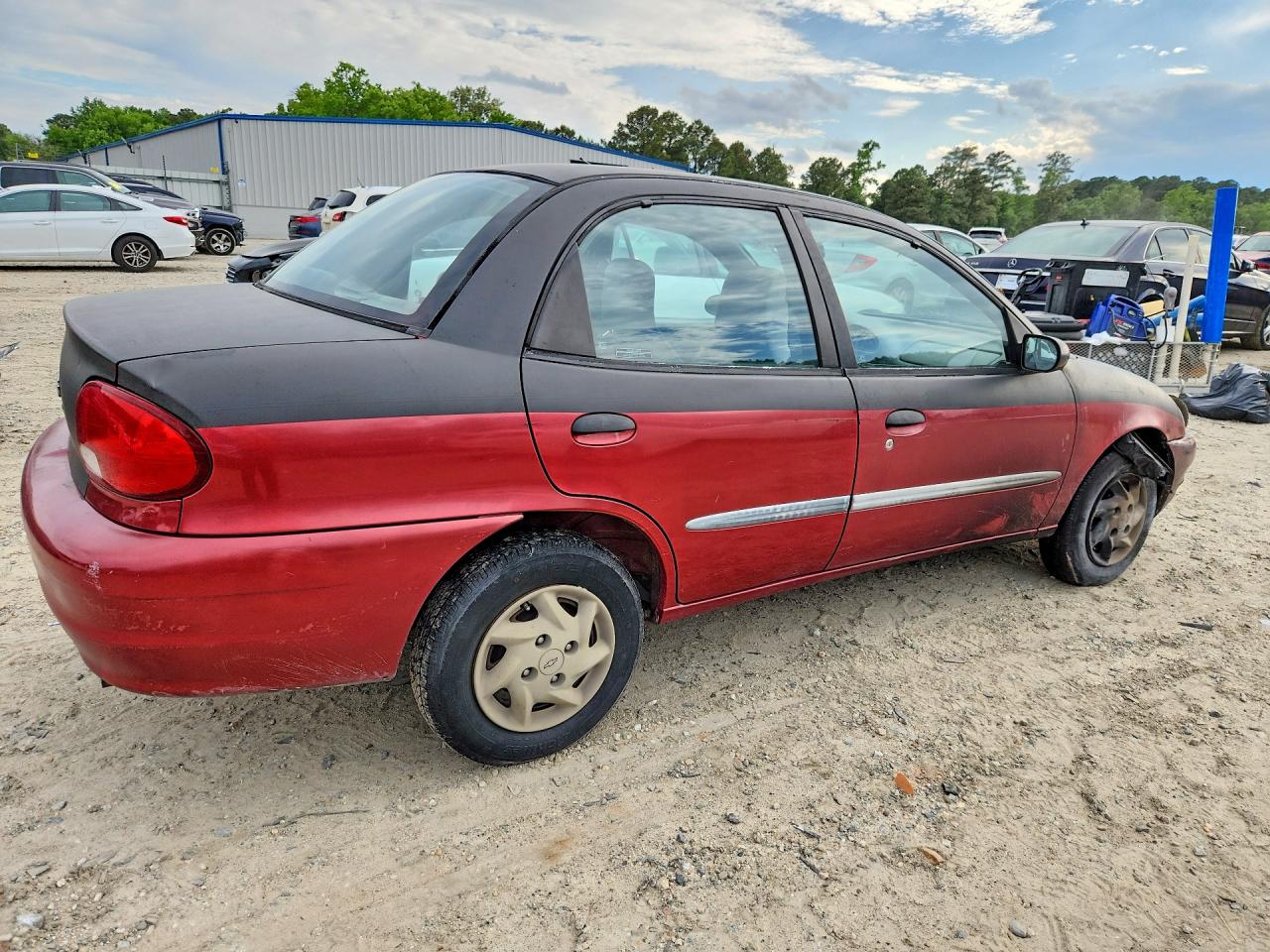 2000 Chevrolet Metro Lsi Бордовый vin: 2C1MR5224Y6721036