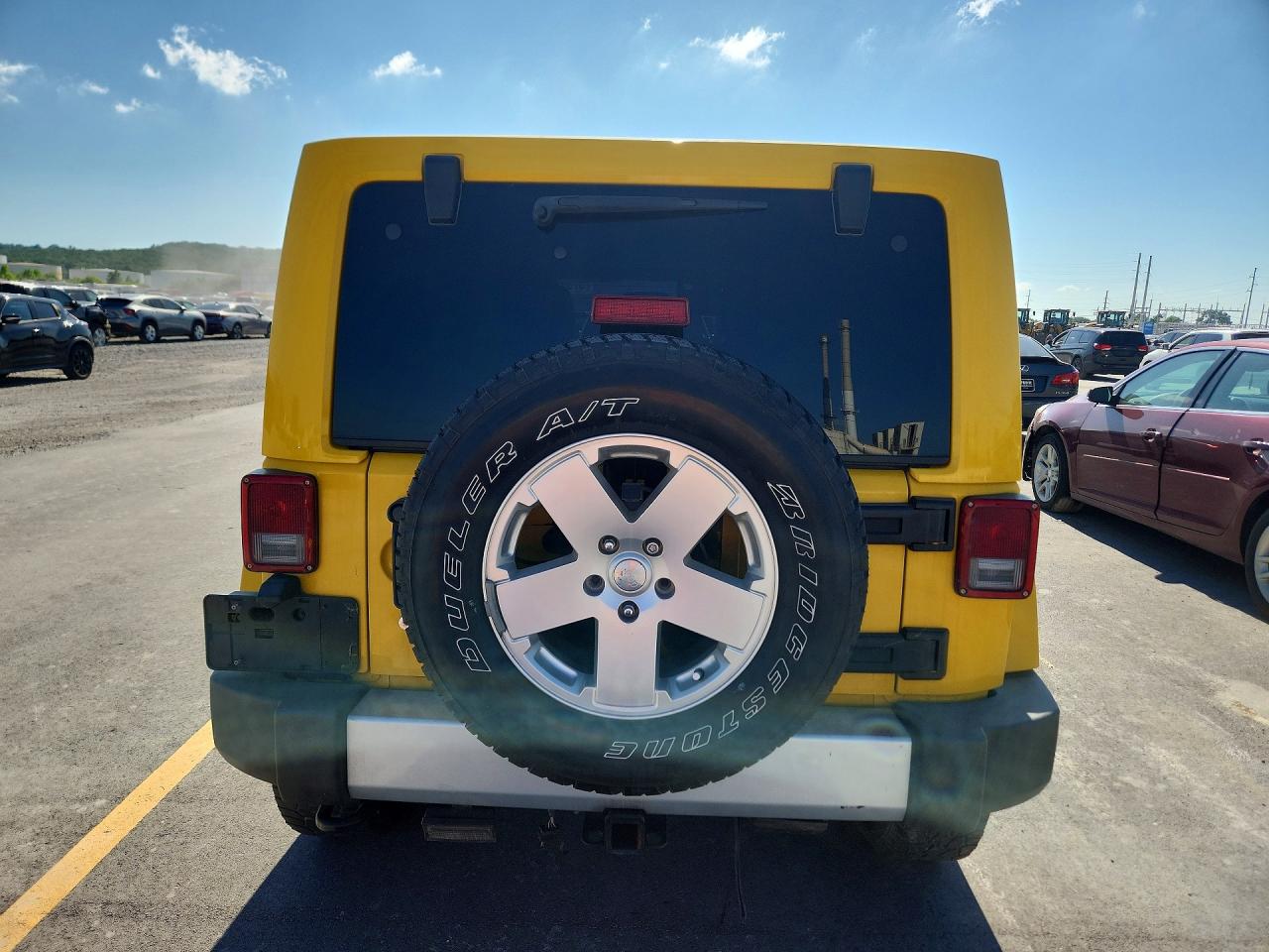 2011 Jeep Wrangler Unlimited Sahara Yellow vin: 1J4HA5H12BL530282