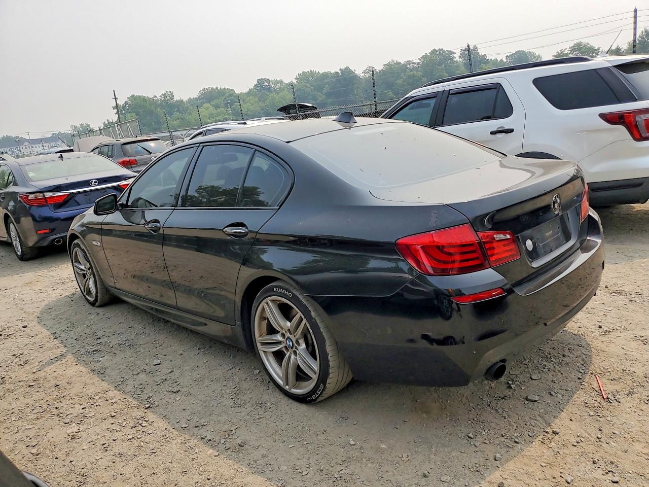 2013 Bmw 535 Xi Черный vin: WBAFU7C5XDDU75830