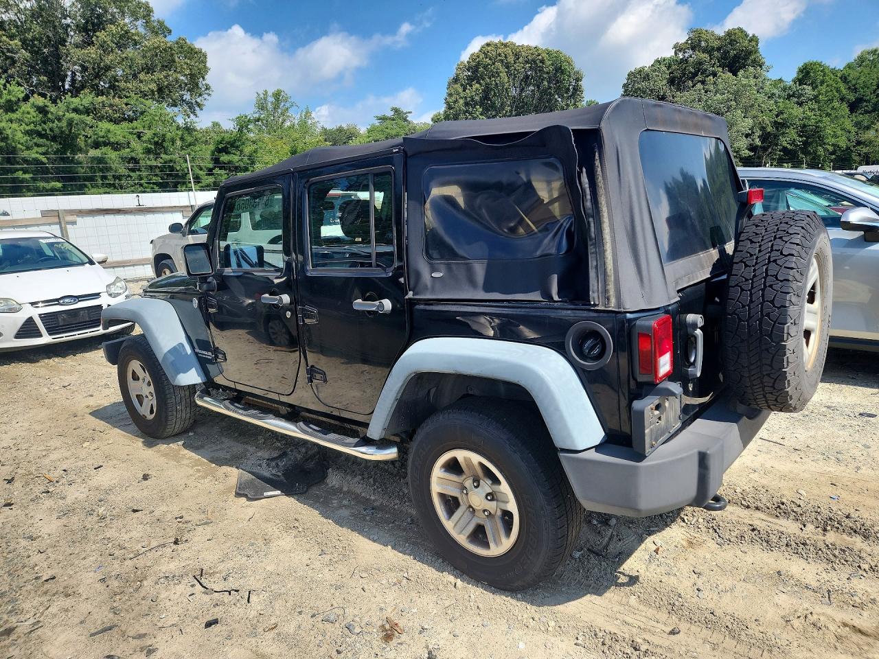 2011 Jeep Wrangler Unlimited Sport Black vin: 1J4BA3H14BL582006
