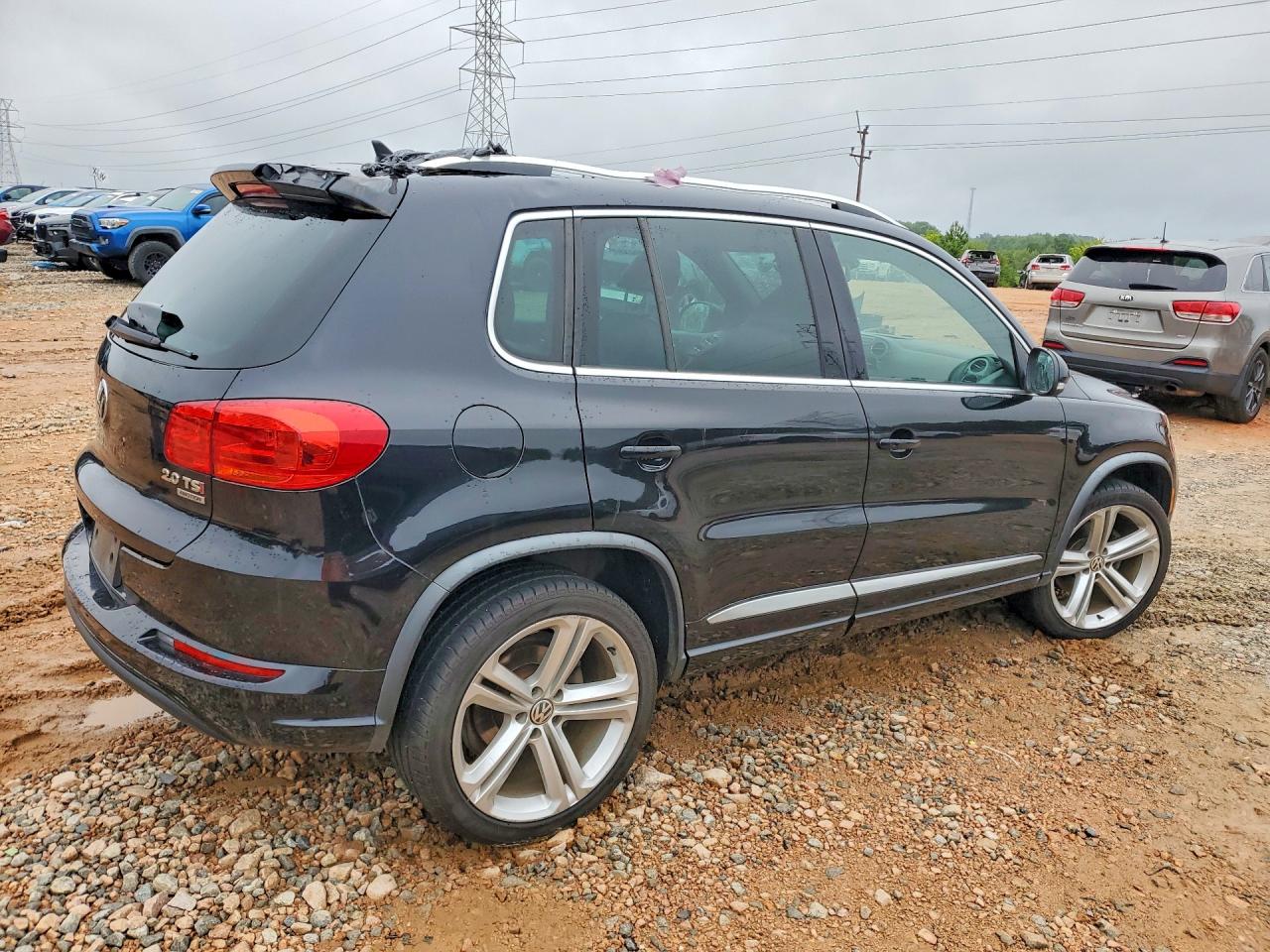 2015 Volkswagen Tiguan S Черный vin: WVGBV7AX0FW507349
