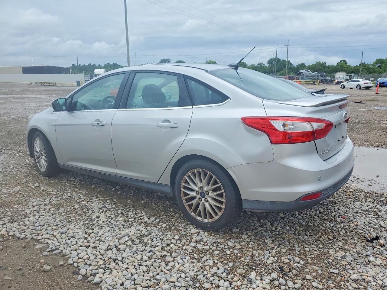 2013 Ford Focus Titanium Серебряный vin: 1FADP3J20DL345814