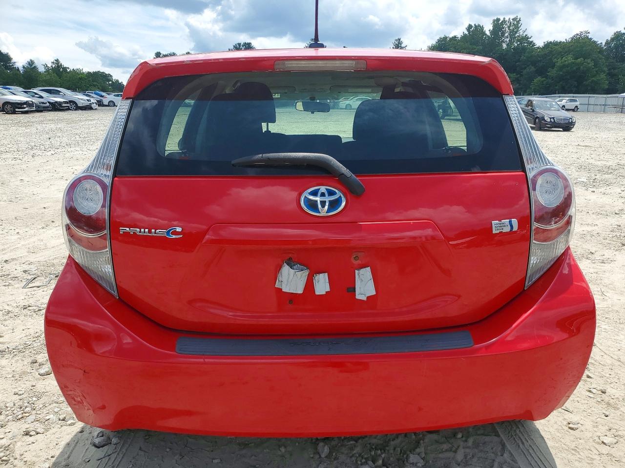 2012 Toyota Prius C Three Red vin: JTDKDTB31C1021590