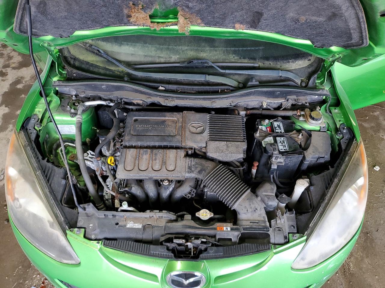 2011 Mazda Mazda2 Зеленый vin: JM1DE1HZ6B0130153