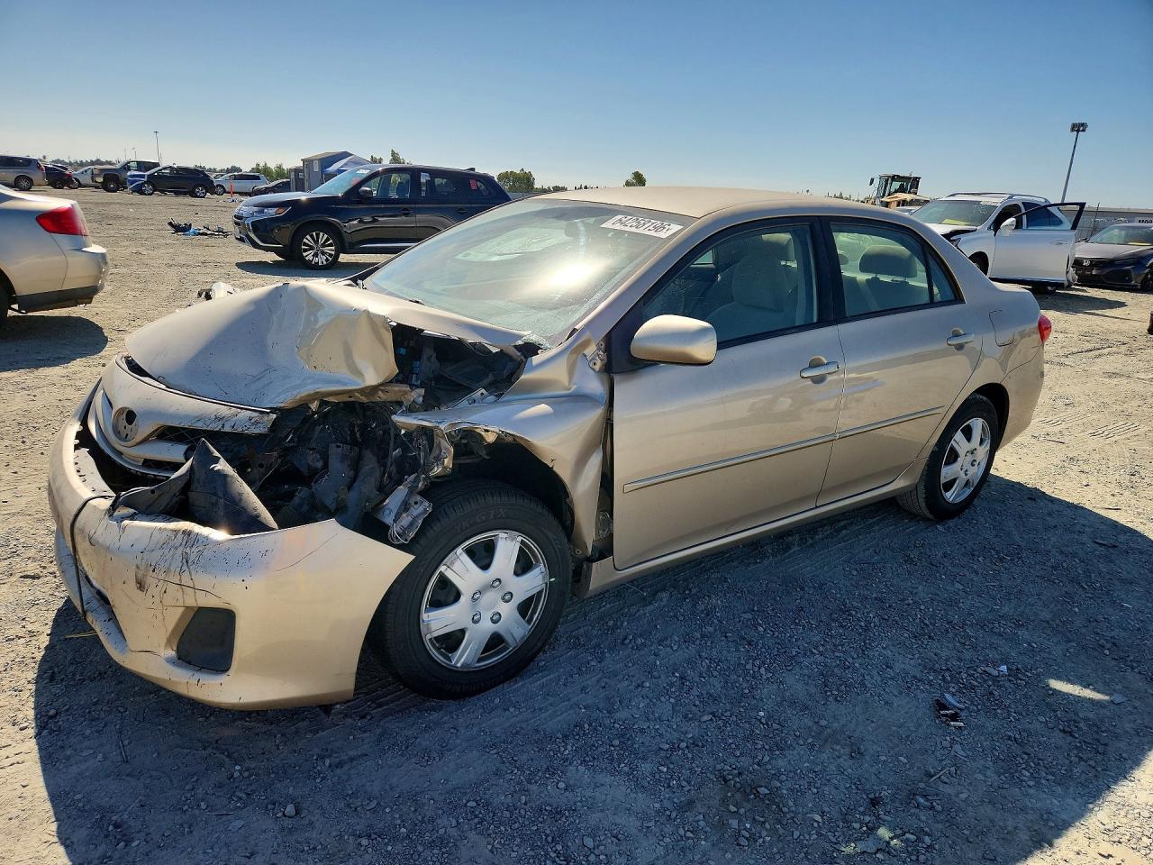2011 Toyota Corolla Le Tan vin: JTDBU4EE4B9167372