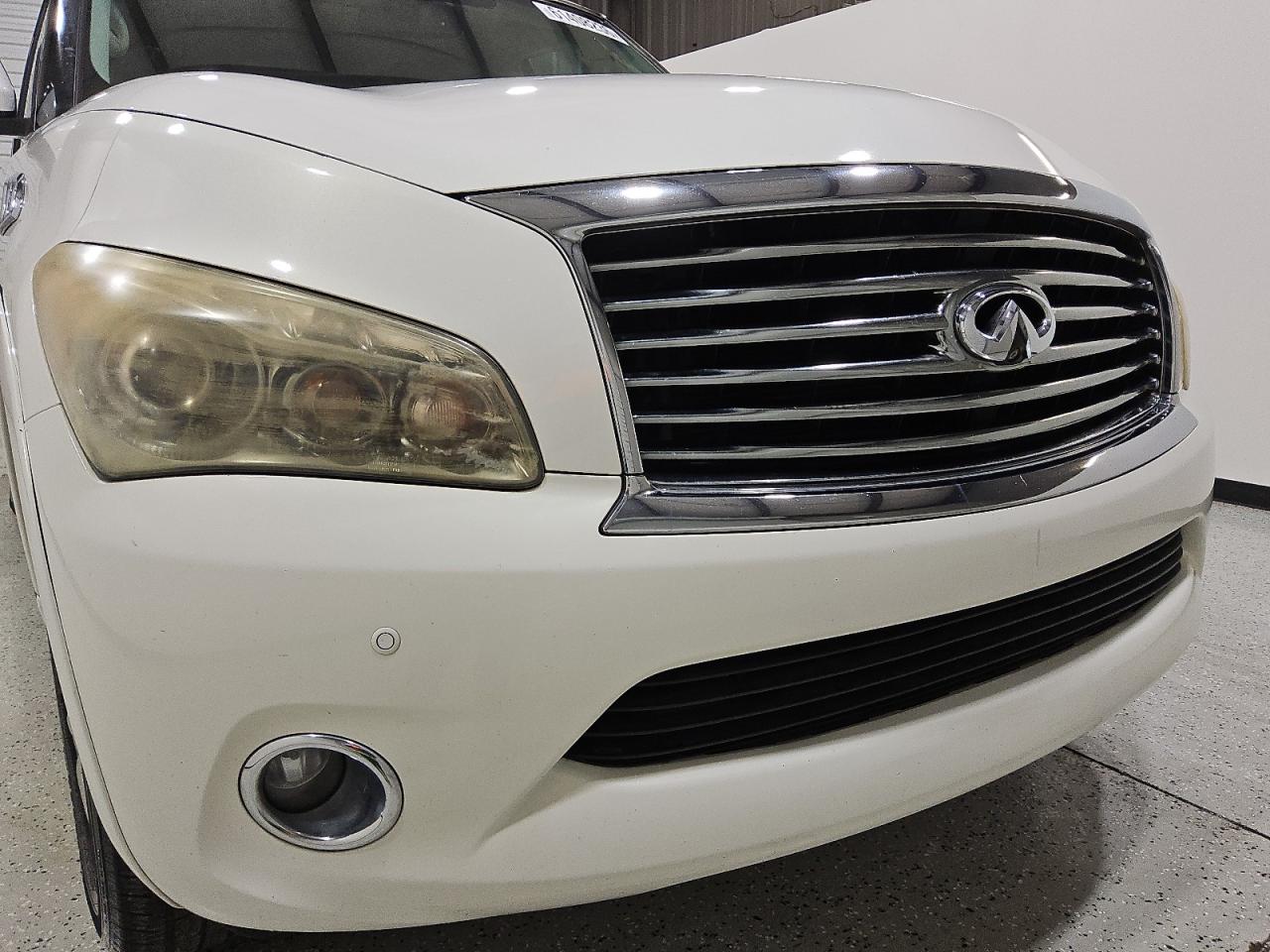 2012 Infiniti Qx56 Base White vin: JN8AZ2NE2C9023374 Damage: Front Bumper/Cover, Previous Repair, Substandard Repair