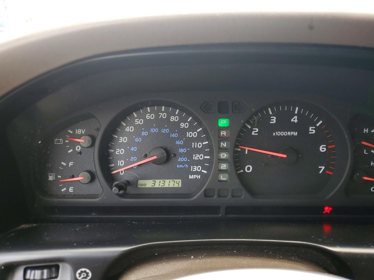 2000 Toyota Land Cruiser Base Beige vin: JT3HT05J2Y0096774