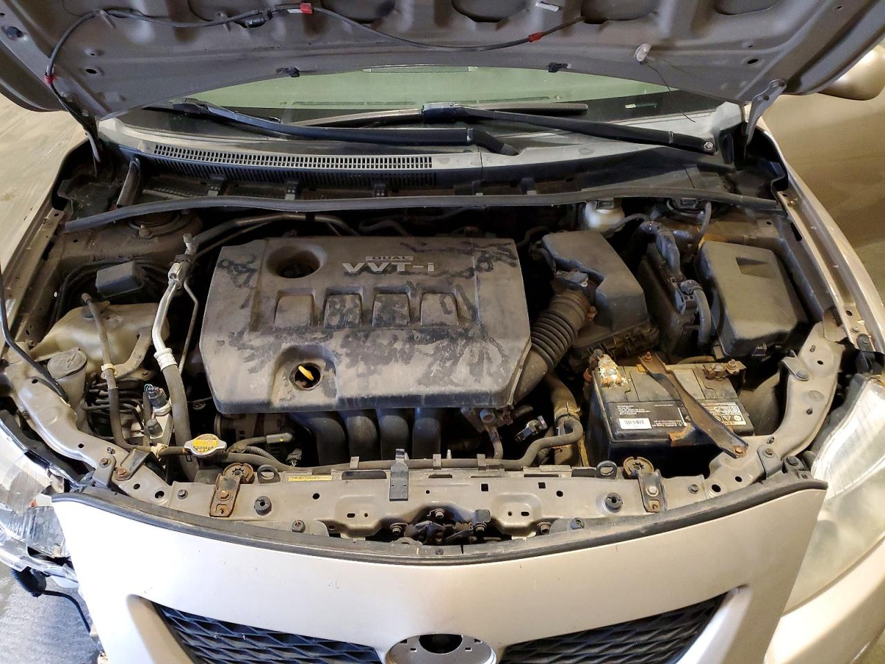 2009 Toyota Corolla Le Gold vin: 1NXBU40E79Z105085