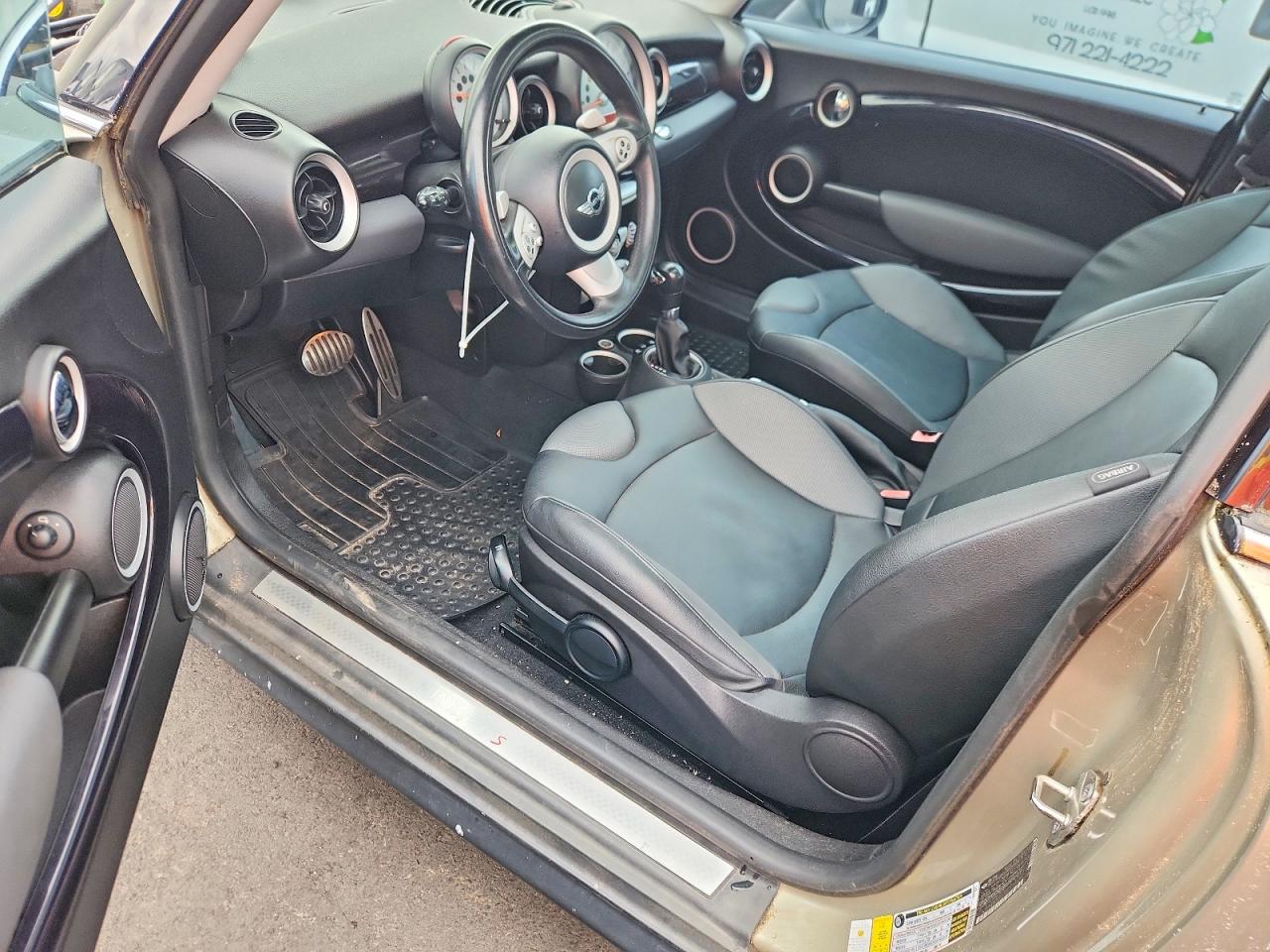 2007 Mini Cooper S Tan vin: WMWMF73517TV31343