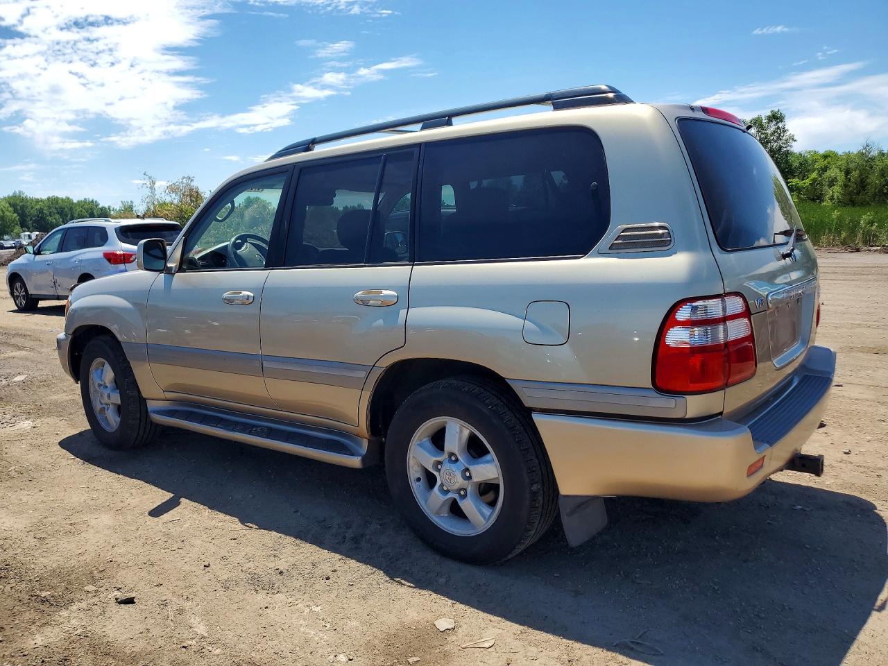 2005 Toyota Land Cruiser Base Gold vin: JTEHT05J152070853