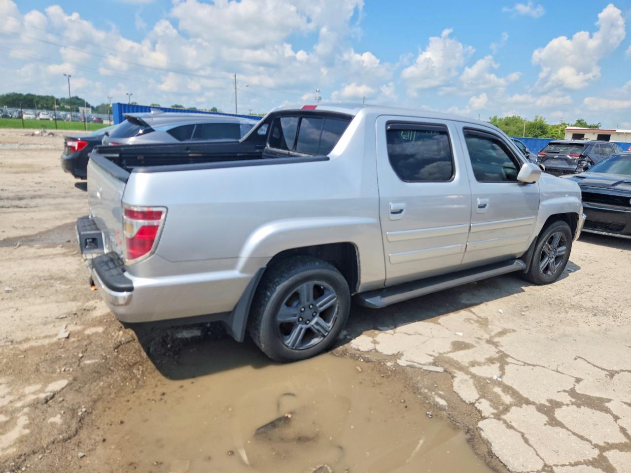 2011 Honda Ridgeline Rtl Silver vin: 5FPYK1F56BB004099