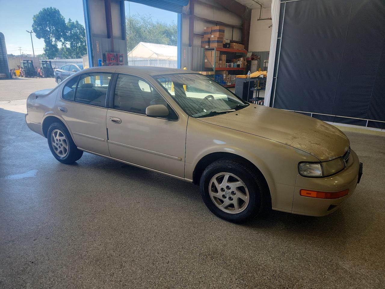 1998 Nissan Maxima Gxe Tan vin: JN1CA21D3WM916456
